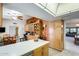 Spacious kitchen with custom cabinetry, ample counter space, and adjoining dining area at 1289 Leisure World --, Mesa, AZ 85206