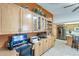 Spacious kitchen featuring a functional office area with a stainless steel refrigerator at 1289 Leisure World --, Mesa, AZ 85206