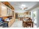 Well-lit kitchen featuring modern appliances and a cozy dining area with a sliding door to the patio at 1289 Leisure World --, Mesa, AZ 85206
