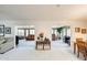 Open-concept living space connecting two living areas with ample natural light at 1289 Leisure World --, Mesa, AZ 85206