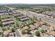 Aerial view of community homes near a busy highway and green spaces, showcasing convenient location at 1360 S Camellia Ct, Chandler, AZ 85286
