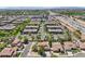 A beautiful aerial view showcasing community homes and proximity to the highway at 1360 S Camellia Ct, Chandler, AZ 85286