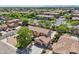 Residential aerial view showing homes with tile roofs and manicured landscaping at 1360 S Camellia Ct, Chandler, AZ 85286