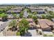 Aerial view of a home with lush landscaping in a well-maintained neighborhood at 1360 S Camellia Ct, Chandler, AZ 85286