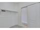 Walk-in closet offers a storage bar for clothing and room for organization at 1414 W Coral Reef Dr, Gilbert, AZ 85233