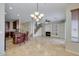 Open floor plan showcases the kitchen and living room, including a fireplace and staircase at 1414 W Coral Reef Dr, Gilbert, AZ 85233