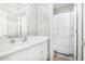 Bright bathroom features a white vanity and a shower/tub combo at 14907 N 177Th Ave, Surprise, AZ 85388