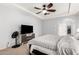 The bright main bedroom offers a ceiling fan and neutral carpet at 14907 N 177Th Ave, Surprise, AZ 85388
