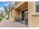 Cozy outdoor patio offering a relaxing space with a view of the property and neighborhood at 14907 N 177Th Ave, Surprise, AZ 85388