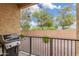 Outdoor patio with a Weber grill and view of the fenced yard for relaxed outdoor living at 14907 N 177Th Ave, Surprise, AZ 85388