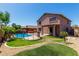 Enjoy a private backyard with a pool, patio, and mature landscaping at 16527 N 71St Dr, Peoria, AZ 85382