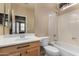 Well-maintained bathroom with a single sink vanity, a bathtub with shower, and neutral decor at 16527 N 71St Dr, Peoria, AZ 85382
