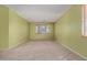 Neutral bedroom offering natural light and a carpeted floor at 16527 N 71St Dr, Peoria, AZ 85382