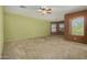 Large primary bedroom featuring big windows and neutral carpet at 16527 N 71St Dr, Peoria, AZ 85382