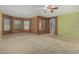 Bedroom featuring plenty of natural light and neutral carpet at 16527 N 71St Dr, Peoria, AZ 85382