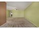 Spacious bedroom with neutral carpet and a ceiling fan at 16527 N 71St Dr, Peoria, AZ 85382