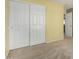 Bedroom featuring a big closet and neutral carpet at 16527 N 71St Dr, Peoria, AZ 85382