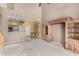 Spacious living room showcasing open concept with a view of the kitchen and dining area at 16527 N 71St Dr, Peoria, AZ 85382