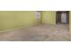 Open-concept living room with abundant natural light and neutral carpet providing a versatile space at 16527 N 71St Dr, Peoria, AZ 85382