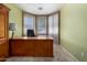Office with traditional desk, neutral walls, and natural lighting at 16527 N 71St Dr, Peoria, AZ 85382