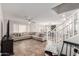 Bright living room with tile flooring, comfortable seating, and an open floor plan at 16632 W Jenan St, Surprise, AZ 85388