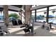 Fitness center with weight machines, treadmills, and view of the pool at 16934 W Bronco Trl, Surprise, AZ 85387