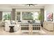 Bright and airy living room showcasing comfortable seating, contemporary decor, and large windows offering natural light at 16934 W Bronco Trl, Surprise, AZ 85387
