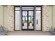 An elegant lobby featuring a reception desk, modern lighting, and decorative accents at 16934 W Bronco Trl, Surprise, AZ 85387