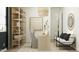 Bright home office featuring a sleek desk, stylish decor, and comfortable seating creating an ideal workspace for productivity at 16934 W Bronco Trl, Surprise, AZ 85387
