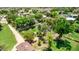 Lush property featuring mature trees, grassy fields, and a playground at 17730 E Brooks Farm Rd, Gilbert, AZ 85298