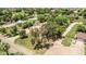 Lush property featuring mature trees, well-maintained lawns and an ample driveway at 17730 E Brooks Farm Rd, Gilbert, AZ 85298
