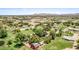 Expansive desert neighborhood showcasing an array of homes, desert landscape, and open sky at 17730 E Brooks Farm Rd, Gilbert, AZ 85298