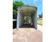 Metal carport structure providing covered parking or storage space on a gravel driveway at 17730 E Brooks Farm Rd, Gilbert, AZ 85298