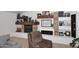 Cozy fireplace with stone surround and wood mantel, complemented by decorative shelves at 17730 E Brooks Farm Rd, Gilbert, AZ 85298