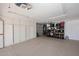 Spacious garage features built-in storage and ample room for vehicles and projects at 17730 E Brooks Farm Rd, Gilbert, AZ 85298