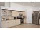 Well-equipped kitchen with stainless steel appliances and custom cabinetry, offering ample storage at 17730 E Brooks Farm Rd, Gilbert, AZ 85298