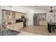 Spacious kitchen features custom cabinets, stainless steel appliances, and a large island at 17730 E Brooks Farm Rd, Gilbert, AZ 85298