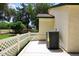 Cozy patio area with white fence and side view of the AC unit at 17730 E Brooks Farm Rd, Gilbert, AZ 85298