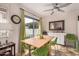 Charming dining area with green chairs and bright lighting, perfect for Gathering meals at 1916 W Morningside Dr # 108, Phoenix, AZ 85023