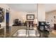 Open kitchen featuring a breakfast bar that overlooks a comfortable living room at 1916 W Morningside Dr # 108, Phoenix, AZ 85023