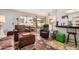 Cozy living room features comfortable seating and seamless access to outdoor dining at 1916 W Morningside Dr # 108, Phoenix, AZ 85023