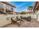 Inviting outdoor patio with comfortable seating and a fire pit, perfect for relaxing evenings at 1916 W Morningside Dr # 108, Phoenix, AZ 85023