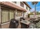 Cozy backyard patio featuring a fire pit, seating area, and lovely landscaping for outdoor enjoyment at 1916 W Morningside Dr # 108, Phoenix, AZ 85023
