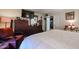 Inviting bedroom features comfortable bed, dresser with a mirror and a cozy ambiance at 1982 E Oxford Dr, Tempe, AZ 85283