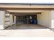 View of a covered carport featuring a beam pergola, painted posts, and an outdoor living area at 1982 E Oxford Dr, Tempe, AZ 85283