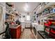 Well-organized laundry room with ample shelving, appliances, and a compact design at 1982 E Oxford Dr, Tempe, AZ 85283