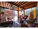 Inviting covered patio with stylish furniture, ceiling fans, and lattice walls for relaxing outdoor living at 1982 E Oxford Dr, Tempe, AZ 85283