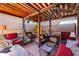 Relaxing covered patio featuring comfortable wicker furniture, ceiling fans, and neutral tones throughout the space at 1982 E Oxford Dr, Tempe, AZ 85283