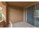 Spacious beige-colored balcony with sliding glass doors offers a seamless indoor-outdoor living experience at 20100 N 78Th N Pl # 3212, Scottsdale, AZ 85255