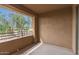 Spacious open-air balcony with beige columns and walls, perfect for enjoying the outdoor scenery at 20100 N 78Th N Pl # 3212, Scottsdale, AZ 85255